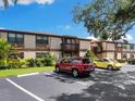 Two-story building with parking and landscaping at 5026 Water Oak Dr # 119, Bradenton, FL 34207