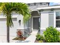 House exterior with stone accents and landscaping at 12665 Promenade Estates Blvd, Sarasota, FL 34238