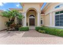 Elegant entryway with columns and double doors at 3218 Signet Ct, Sarasota, FL 34240