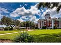 Historic courthouse with manicured lawn and landscaping, in a town square at 12215 Stirrup Dr, Dade City, FL 33525