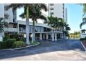 Beautiful building entrance featuring lush landscaping, and an upscale, well maintained entryway at 19 Whispering Sands Dr # 204, Sarasota, FL 34242