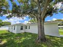 Rear view of a freshly painted house, showcasing its clean lines at 100 N Duncan Ave, Clearwater, FL 33755