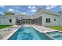 Stunning pool and patio area, perfect for outdoor entertaining at 2231 Wood St, Sarasota, FL 34237