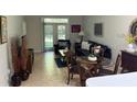 Open living space with comfortable seating and a view to the backyard at 3604 54Th W Dr # 103, Bradenton, FL 34210