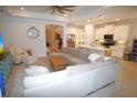 Spacious living room with large sectional sofa at 118 Veraza Ct, Nokomis, FL 34275
