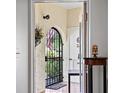 View of a tiled entryway with an arched gate at 6101 34Th W St # 16A, Bradenton, FL 34210