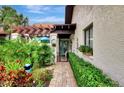 Inviting walkway to front door, nicely landscaped at 3124 Windrush Bourne # 10, Sarasota, FL 34235