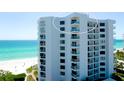 Oceanfront high-rise building with balconies overlooking the ocean at 1000 Longboat Club Road # 1103, Longboat Key, FL 34228