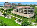 Luxury building exterior with water views at 3080 Grand Bay Blvd # 532, Longboat Key, FL 34228