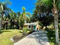 Quaint single story home with a large yard and driveway at 2888 N Cranberry Blvd, North Port, FL 34286