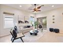 Bright and airy living room with stylish furniture at 4405 Lenox Blvd, Venice, FL 34293