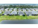 Aerial view of community homes by the lake at 2942 Trustee Ave, Sarasota, FL 34243