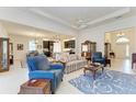 Spacious living room with a view into the kitchen and dining area at 12105 Goldenrod Ave, Bradenton, FL 34212