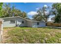 Updated home with a large backyard and mature trees at 403 Pinewood Ave, Nokomis, FL 34275