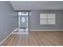 Bright entryway with vinyl flooring and neutral-toned walls at 13592 Clara Ln, Port Charlotte, FL 33981