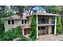 Two story house with balcony and patio at 875 Indian Beach Dr, Sarasota, FL 34234