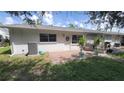 Private patio and fenced yard with AC unit at 6023 Hibiscus Dr # 177, Bradenton, FL 34207