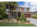 Two-story house with a large front yard at 2824 Esmeralda Dr, Sarasota, FL 34243