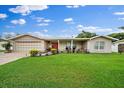 Ranch style home with a covered porch at 2611 Sunnyside St, Sarasota, FL 34239