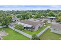 Aerial view of house and surrounding area at 2611 Sunnyside St, Sarasota, FL 34239