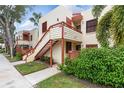 Condo building showcasing architectural details and landscaping at 530 Spring Lakes Blvd, Bradenton, FL 34210