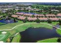 Aerial view of Miramar at the Country Club community, showcasing homes, lakes, and golf course at 8364 Miramar Way, Lakewood Ranch, FL 34202