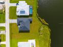 Property located on the lakefront with a large backyard at 1094 Rotonda Cir, Rotonda West, FL 33947
