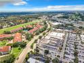 Aerial view of community near highway and waterfront at 2587 Countryside Blvd # 6111, Clearwater, FL 33761