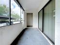 Screened balcony with access to storage unit at 2587 Countryside Blvd # 6111, Clearwater, FL 33761