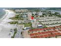 Beachfront condo building, highlighting a specific unit at 6142 Midnight Pass Rd # 14N, Sarasota, FL 34242