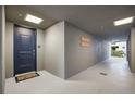Interior hallway with access to residential units at 383 Aruba Cir # 101, Bradenton, FL 34209