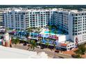 Aerial view of modern building with pool and city views at 111 S Pineapple Ave # 1009, Sarasota, FL 34236