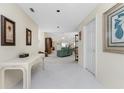 View of living room from entryway with tiled floors at 1326 Wesley Dr # 132, Punta Gorda, FL 33950