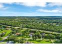Aerial view of neighborhood with lush landscape at 22408 76Th E Ave, Bradenton, FL 34211