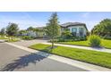 Desirable one-story home with paver driveway, two-car garage, and attractive landscaping at 14480 Eagle Branch Dr, Nokomis, FL 34275