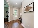 Light and bright entryway with wood-look flooring at 3360 Chestertown Loop, Bradenton, FL 34211