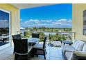 Spacious balcony with outdoor furniture and breathtaking views at 915 Seaside Dr # 312 Weeks 8-9, Sarasota, FL 34242