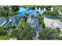 House with a pool, located on a lake at 13814 Nighthawk Ter, Lakewood Ranch, FL 34202