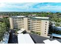 Aerial view of a building showcasing its exterior and parking at 512 W Venice Ave # 403, Venice, FL 34285