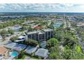 Aerial view of residential building near tennis courts and park at 512 W Venice Ave # 403, Venice, FL 34285