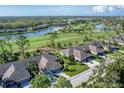 Aerial view of home on golf course community at 5092 Mahogany Run Ave, Sarasota, FL 34241