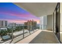 Private balcony with stunning sunset and city views at 301 Quay Commons # 1209, Sarasota, FL 34236