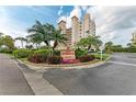 Estuaries II building entrance with landscaping and signage at 2625 Terra Ceia Bay Blvd # 205, Palmetto, FL 34221