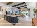 Open concept kitchen with island and modern appliances at 18138 Home Run Dr, Venice, FL 34293
