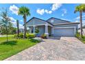 Newly built home with two-car garage and curb appeal at 904 Whimbrel Run, Bradenton, FL 34212