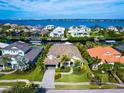 Luxury waterfront home with private dock, located in a desirable community at 576 Fore Drive, Bradenton, FL 34208