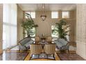 Elegant lobby with plush seating and large windows at 800 N Tamiami Trl # 1412, Sarasota, FL 34236