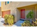 Red front door and well-maintained landscaping at 4013 Catalina Dr # 4013, Bradenton, FL 34210