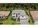Luxury home with tile roof, large driveway & landscaped yard at 16215 Tradewind Ter, Lakewood Ranch, FL 34211