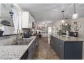 Spacious kitchen with granite countertops and island at 8454 Imperial Cir, Palmetto, FL 34221